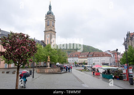 Eisenach, Germany - May 11, 2019: View of the St. George's Church and George Fountain in Eisenach, Germany. Stock Photo