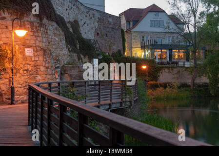 Bad Salzungen, Germany - May 10, 2019: View of an old house at the Burgsee lake in Bad Salzungen, a spa town in East Germany. Stock Photo