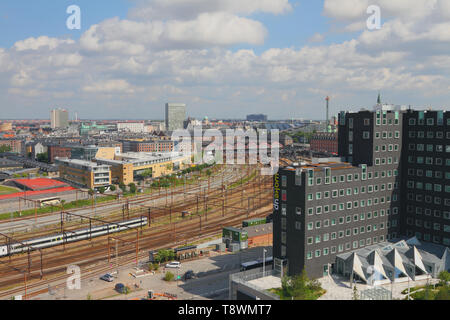 Copenhagen, Denmark - Jun 09, 2012: City, railway tracks and hotel Stock Photo