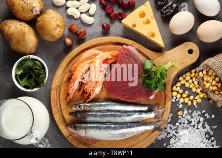 Foods rich in iodine on grey background Stock Photo