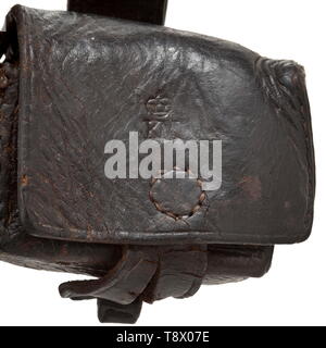 A German navy holster with accessory bags for an Adams M/69 Revolver from Schilling manufacture, Suhl Made from a Colt M/57 holster by extending it to 270 mm. Dark brown, strong cowhide with pouch for spare cylinder and front pocket for primer box. Closing strap and pouch for spare cylinder both with navy acceptance stamp crown/KM. Brass closing knob on holster, leather toggles on accessory bags. Stitches in good order. Very good overall condition. Additionally a brass primer box marked "K M 866", blued steel mounts. Fully functional. Note: The A, Additional-Rights-Clearance-Info-Not-Available Stock Photo