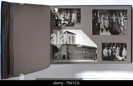 Rudolf Heß - a monumental photo album of Hitler's visit to Italy 1938 'Il Viaggio Del Führer in Italia - 3 - 9 Maggio Anno XVI - Omaggio del Marchese G. Paulucci Di Calboli Barone - Presidente dell'Istituto Nazionale Luce'. 57 plates with photos in various sizes. Reception at the Brenner, welcome in Modena, arrival and reception in Rome by King Viktor Emanuel, Mussolini and Ciano, ride through Rome, wreath-laying ceremony at the national monument (Hitler already wearing the fascist dagger), handing over of the gift by Achille Starace in the presence of Goebbels and German d, Editorial-Use-Only Stock Photo