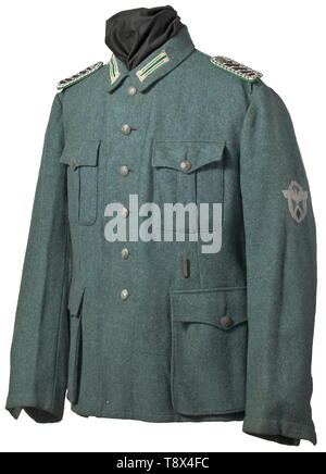 A field tunic M 42 for a Meister (senior NCO) of the Reich Protection Police maker Ha-Gra, Vienna, 1944 Police-green woollen cloth with field-grey buttons, the brown imitation silk liner with corresponding size-, maker- and supply stampings, button-on collar bind. Silver woven collar tabs M 43, BeVo sleeve eagle, slip-on shoulder boards. historic, historical, 20th century, Additional-Rights-Clearance-Info-Not-Available Stock Photo