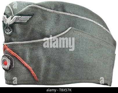 A garrison cap M 38 'Schiffchen' for officers of panzer troops Private purchase piece of fine field-grey cloth, officer's braid, grey-brown inner liner with leather sweatband at the brow, BeVo weave national eagle in officer quality, hand embroidered cap cockade, pink soutache chevron. Small area of contemporary repairs, signs of use. historic, historical, army, armies, armed forces, military, militaria, object, objects, stills, clipping, clippings, cut out, cut-out, cut-outs, 20th century, Editorial-Use-Only Stock Photo