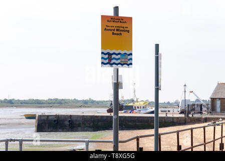 A popular beach for bathers at Leigh on Sea near Southend, Essex, has been declared as unsafe due to the presence of E-coli and intestinal enterocci bacteria, most commonly found in faeces. Southend Council will be installing 'advice against swimming' signs around Bell Wharf, whilst investigations take place to ascertain the cause of the contamination and take action alongside the Environment Agency and Anglian Water but as yet the only signs visible tell people that they are entering an award winning beach Stock Photo