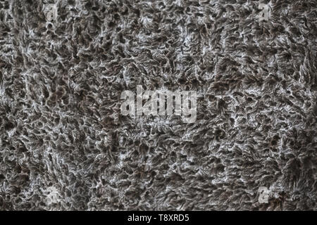 Abstract pattern or sworls and loops - Close-up of light through toweling cloth, almost monochrome. Stock Photo