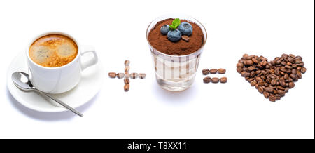 Cup of coffee plus Classic italian tiramisu dessert with blueberries in a glass equally love heart shape of coffee Stock Photo