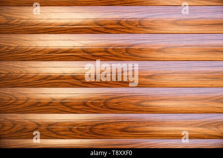 Texture of the roller brown shutter as a background. Stock Photo