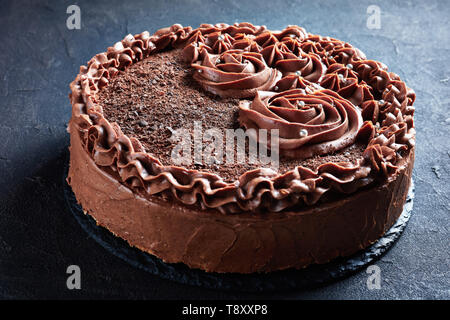 Chocolate Meringue Festive Cake Topped With Chocolate Buttercream Roses And Silver Edible Dragee Vertical View Stock Photo Alamy