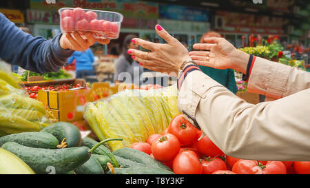 Sales of fresh and organic fruits and vegetables at the green market or farmers market. Stock Photo