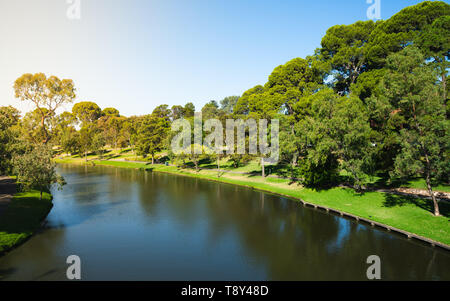 Torrens river and riverbank garden and promenade view in Adelaide SA Australia Stock Photo