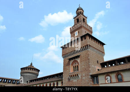 View from courtyard to ancient central entrance medieval tower of Sforza castle, Castello Sforzesco in Milan.