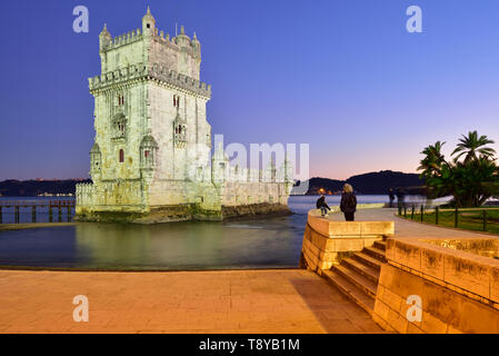 Torre de Belém (Belém Tower), in the Tagus river, a UNESCO World Heritage Site built in the 16th century in Portuguese Manueline Style at twilight. It Stock Photo