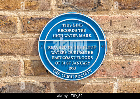 Blue plaque marking the high water mark reached by flood waters during east coast floods of 31st January 1953. North Sea Flood. The Leigh Society Stock Photo