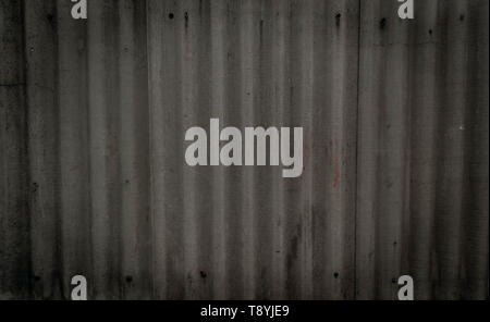 Texture of old gray concrete wall with quilting handprints and bolts. With space for text. Wallpaper for design Stock Photo