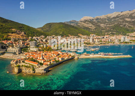 Budva is a town in Montenegro on the Adriatic Sea. Part of the Budva Riviera, it's known for sandy beaches and nightlife. Stone walls built by the Ven Stock Photo