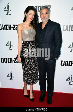 Amal Clooney (left) and George Clooney attending the Catch-22 UK Premiere, held at VUE Cinema Westfield, London. Stock Photo