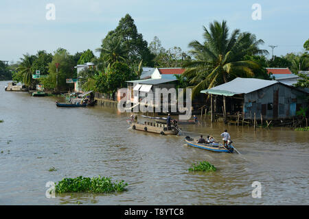 Phong Dien, Vietnam - December 31st 2017. Boats leave the Phong Dien Floating Market near Can Tho in the Mekong Delta Stock Photo