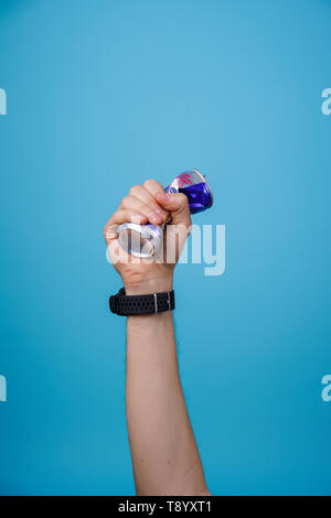 Hand with Crumpled can garbage, Stock Photo