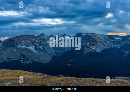 Dark Mountains - An overcast dusk view of Forest Canyon and peaks of Continental Divide, seen from Trail Ridge Road, Rocky Mountain Nation Park. USA. Stock Photo