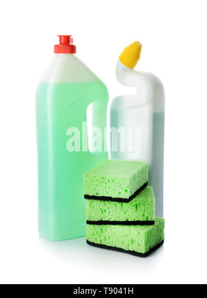 Detergents and cleaning accessories on a green background. Housekeeping  concept Stock Photo - Alamy