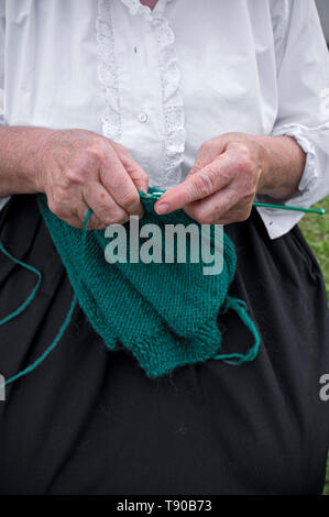 close-up of hands knitting Stock Photo