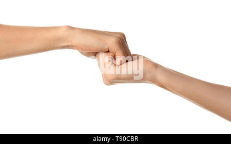 Clasped female hands on white background