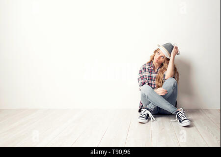 Young lady moving in new house concept Stock Photo