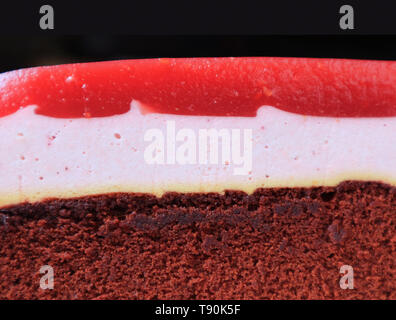 Closeup the Texture of Raspberry Mousse with Chocolate Sponge Layer Cake for Background Stock Photo