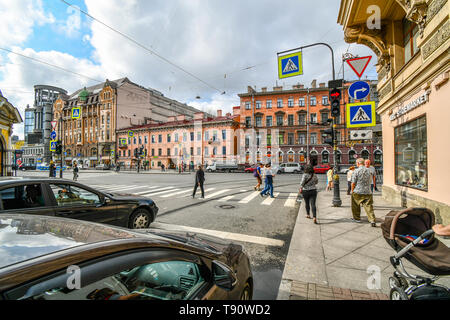 Pedestrians enjoy the afternoon in the urban downtown center of the Baltic city of St. Petersburg, Russia. Stock Photo