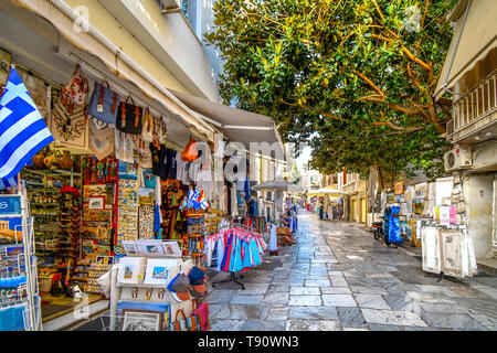 A typical tourist street and neighborhood in the Plaka District of Athens, Greece, with cafes, souvenirs and markets Stock Photo