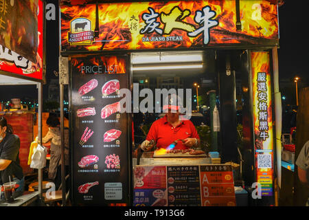 Tainan Flower Night Market or Garden Night Market, is a tourism night market in North District, Tainan, Taiwan. Stock Photo