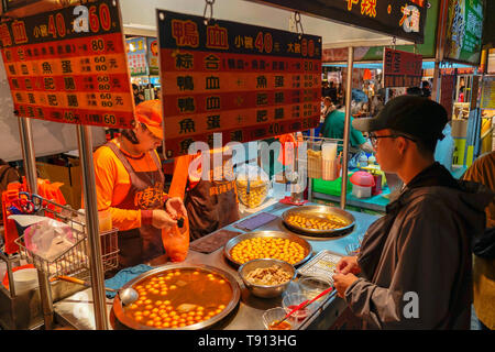 Tainan Flower Night Market or Garden Night Market, is a tourism night market in North District, Tainan, Taiwan. Stock Photo