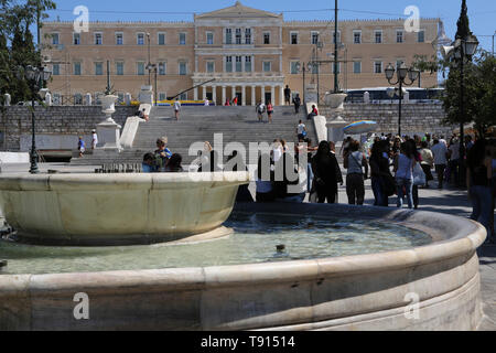 Athens Greece Vouli parliament building syntagma square people around Fountain Stock Photo