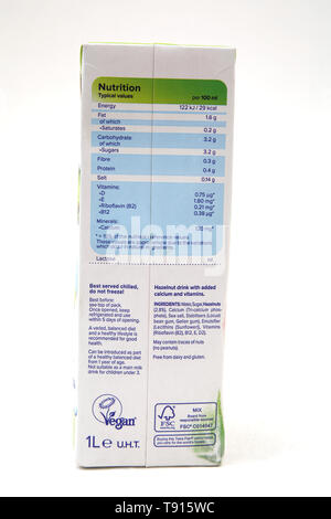 Vegan Alpro Hazelnut Lactose Free Milk Alternative Tetra Pack showing Nutritional Information Stock Photo