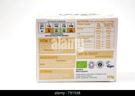 The Tofoo Co Organic Beechwood Smoked Tofu back of pack showing Ingredients, Nutritional Information and Logos Stock Photo