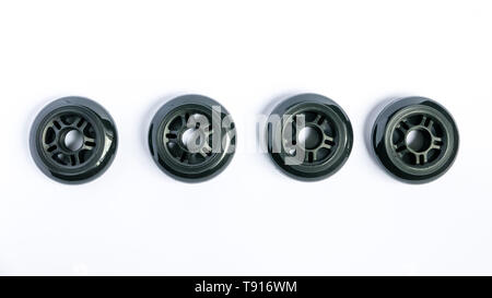 Inline skate wheels, a set of rollerblade wheels isolated on white background Stock Photo