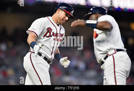 Atlanta, GA, USA. 15th May, 2019. Atlanta Braves outfielder Austin Riley celebrates with his first base coach while rounding first base after hitting a fourth inning home run during a MLB game against the St. Louis Cardinals at SunTrust Park in Atlanta, GA. Austin McAfee/CSM/Alamy Live News Stock Photo