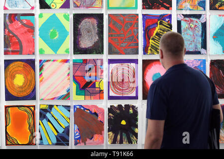 Lisbon, Portugal. 15th May, 2019. A guest looks at an art piece during the official inauguration of the ARCO Lisboa International Contemporary Art Fair in Lisbon, Portugal, on May 15, 2019. ARCO Lisboa will open to the general public from May 16 to 19. Credit: Pedro Fiuza/Xinhua/Alamy Live News Stock Photo