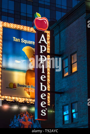 Applebee's sign outside the premises during nighttime Applebeeís International, Inc. Stock Photo