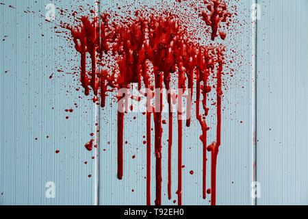 Blood stains on light wall Stock Photo