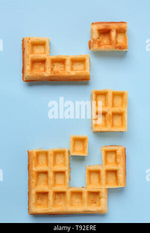 Creative composition with waffles on light background Stock Photo