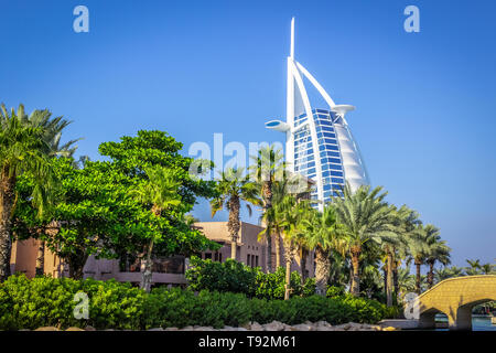 Dubai, UAE - November 29, 2018: View on Burj Al Arab, the world only seven stars hotel seen from Madinat Jumeirah, a luxury resort which include hotel Stock Photo