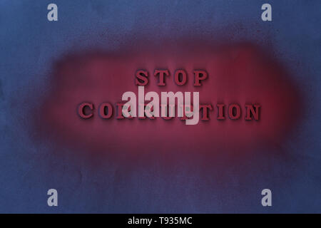Text STOP CORRUPTION on dark background Stock Photo