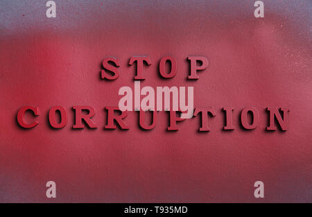Text STOP CORRUPTION on dark background Stock Photo