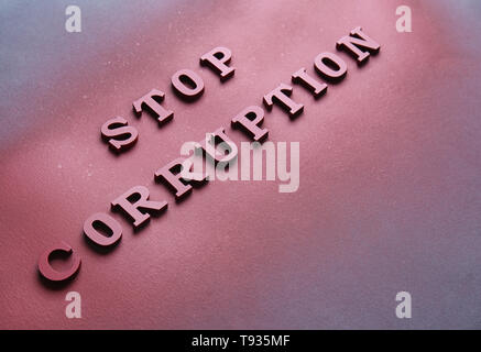 Text STOP CORRUPTION on dark background Stock Photo