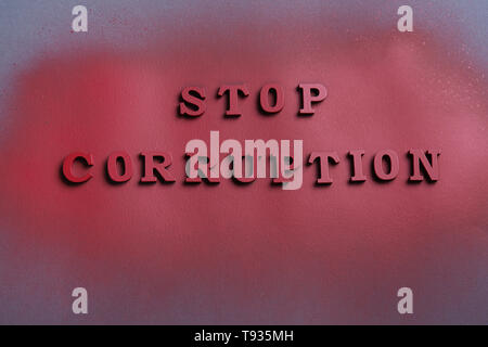 Text STOP CORRUPTION on dark background Stock Photo