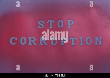 Text STOP CORRUPTION on dark background Stock Photo
