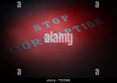 Text STOP CORRUPTION on dark background Stock Photo
