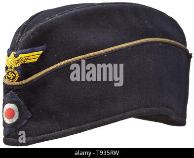 A 'Schiffchen' on-board cap for officers of the Kriegsmarine Depot piece of navy-blue woollen cloth, continuous golden officer's braid, black inner liner, BeVo weave insignia on a dark blue ground. Light signs of usage. historic, historical, navy, naval forces, military, militaria, branch of service, branches of service, armed forces, armed service, object, objects, stills, clipping, clippings, cut out, cut-out, cut-outs, 20th century, Editorial-Use-Only Stock Photo